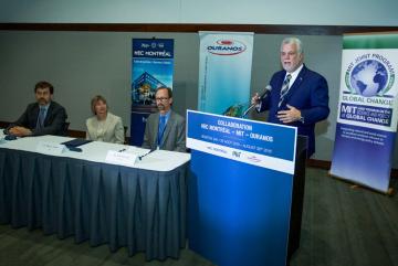 Québec Premier Philippe Couillard delivers remarks after Professor Pierre-Olivier Pineau, chair in energy sector management at HEC Montréal; MIT Vice President for Research Maria Zuber; and Ouranos Executive Director Alain Bourque sign a...