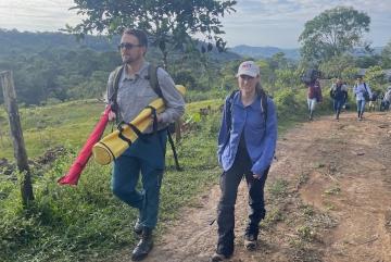 
              Sean Anklam (left), Marcela Angel, and a team from Corpoamazonia in the mountains outside Mocoa, Colombia, make their way to deploy an unpioloted aerial vehicle on a test flight.
              Photo: Adam Kersnowski
      