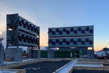 Pictured are two of the four absorber units at Climeworks’ direct air capture and storage plant, Orca, in Hellisheidi, Iceland. Each absorber unit can remove about 1,000 tons of carbon dioxide per year. 