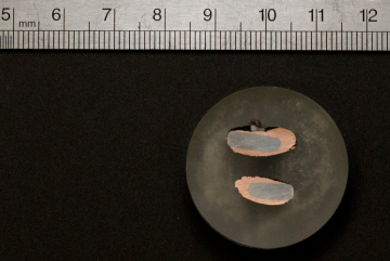 A sample of nearly pure copper is deposited on an iron electrode after extraction through an electrochemical process developed by researchers in the lab of MIT Associate Professor Antoine Allanore.Photo: Denis Paiste/Materials Research Laboratory