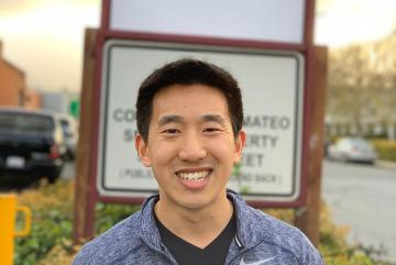 
              Joel Jean PhD ’17, co-founder of Swift Solar, stands in front of the company’s sign at its permanent location in San Carlos, California.
              Photo courtesy of Joel Jean.
      