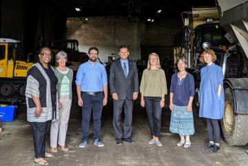 The Malden Works team gathered in the Malden, Massachusetts, Department of Public Works garage during a recent site tour: (left to right) Marcia Manong, Karen Buck, Evan Spetrini, Gary Christenson, Amber Christoffersen, Kathleen Vandiver, and Mari...