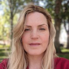headshot photo of woman with blond hair